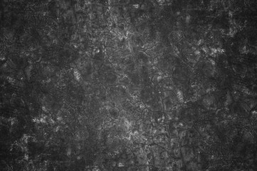 Obraz na płótnie Canvas cement cracks old black wall.