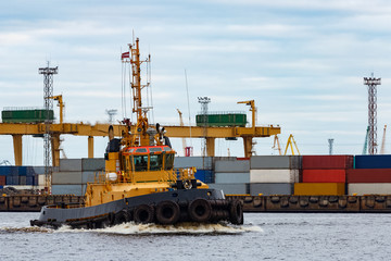 Tug ship in cargo port
