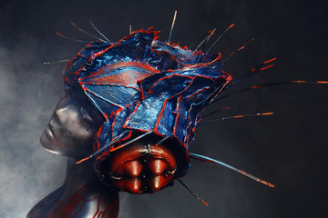 Mannequin in creative head wear with spikes