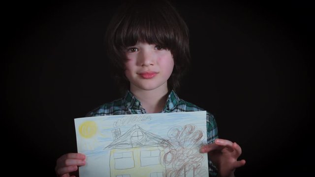 4K Cute Child Holding in Hands House Drawing