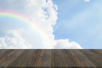 Blue sky cloud with Wood terrace and rainbow
