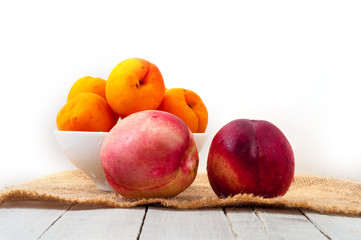 Peaches in white bowl