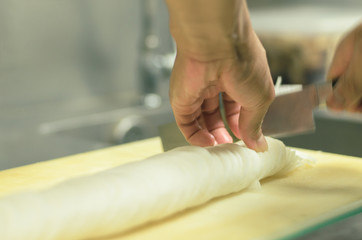 Chef cutting radish with skillfully and cutting fast