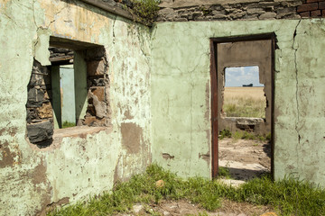 Ruins of a old farm house.  Texture and colors.