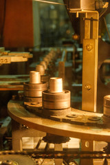 The machine for blowing plastic PET bottles.