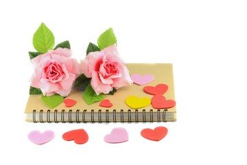 heart with  rose pink on book on white background  valentine day concept