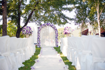 Wedding Arch on the nature of the white and purple shades.