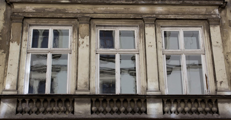 Fototapeta na wymiar Three vintage front glass windows of an old house