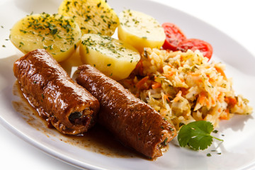 Wrapped pork chop with boiled potatoes
