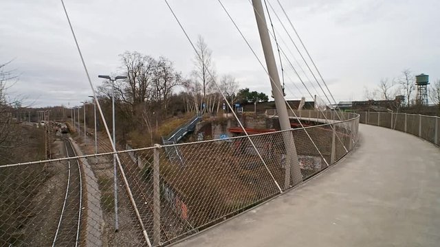 curving bridge over railroad