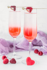 Raspberry cocktail with white wine. Romantic concept