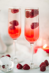 Fototapeta na wymiar Raspberry cocktail with white wine. Romantic concept