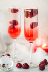 Raspberry cocktail with white wine. Romantic concept