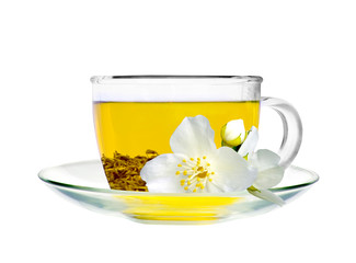 glass cup of green tea with jasmine flowers isolated on white