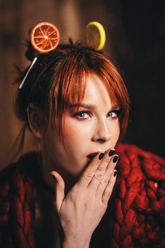 Fashion readhead model on wood background