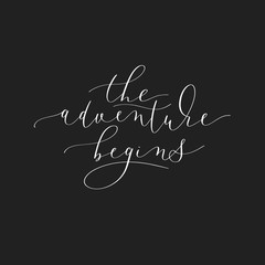 The adventure begins black and white hand written lettering to p