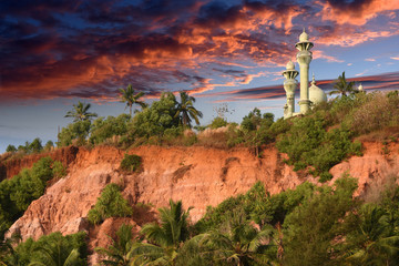 Mosque on top of red colored stones cliff in Varkala, Kerala, India 