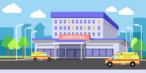 Obraz na płótnie Canvas Urban hospital building exterior with ambulances on yard
