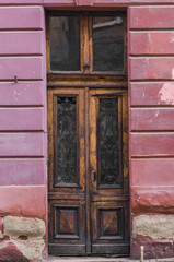 Fototapeta na wymiar Antique vintage entrance wooden door to the old house.
