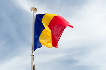 Flag of Romania floats in the wind