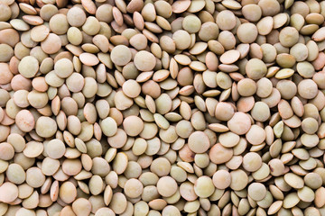 Lentils pulse legumes vegetables vegetarian food background.