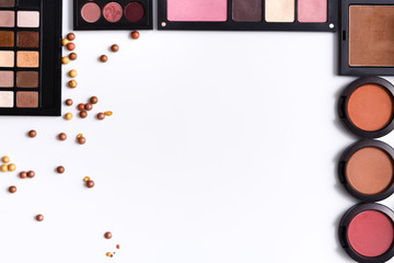 Makeup cosmetics tools and essentials frame background, copy space