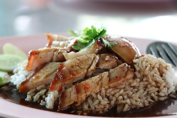 Red pork over rice  thai food closed up image