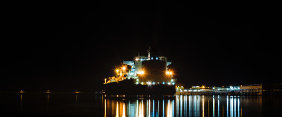 LNG TANKER AT THE GAS TERMNAL - seaport at night © Wojciech Wrzesień
