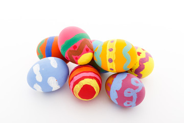 Fototapeta na wymiar Child painted Easter egg on white background