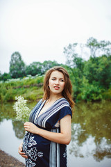 pregnant woman near the water