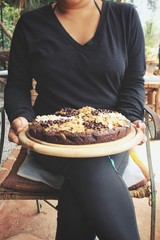 Chocolate brownies cake on hand