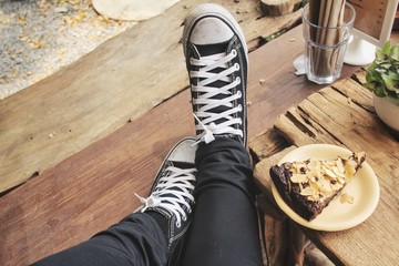 Selfie of woman with chocolate brownies cake