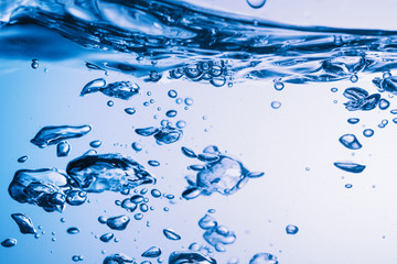 Water surface with ripple and bubble