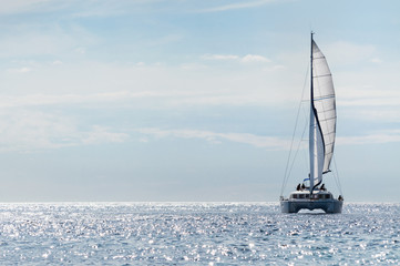 Sailboat yacht on blue sea in summer - obrazy, fototapety, plakaty