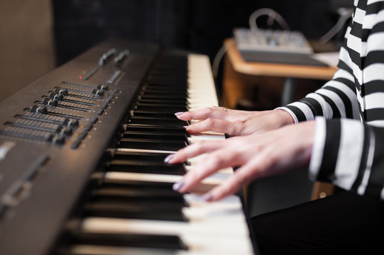 Hands music, synthesizer, piano
