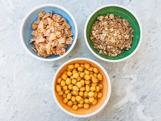 three kind of cold breakfast cereals on table