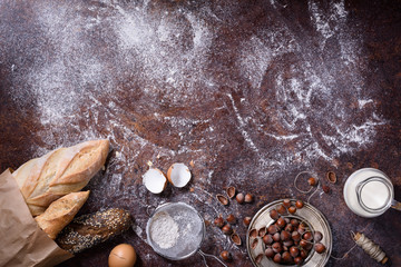 Freshly baked breads, baking ingredients. Bakery background, breakfast food. Top view, copy space.