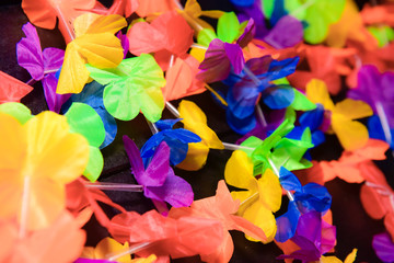 Necklaces of colored flowers. Picture for background