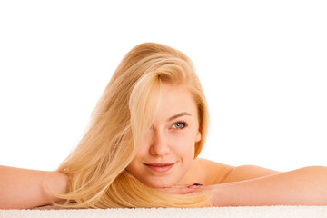 skin care - beautiful young woman nurturing her skin isolated over white background