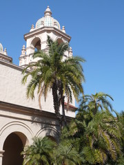 Fototapeta na wymiar Palm tree in front of Californian church