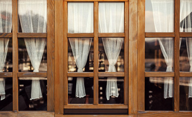Decorative Wooden Windows and Curtains - 141148812