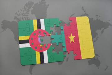 puzzle with the national flag of dominica and cameroon on a world map