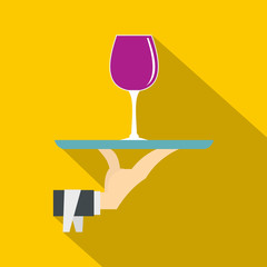 Hand holding tray with a glass of red wine icon