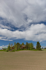 Farmhouse on top of a hill