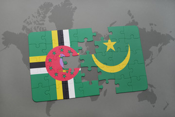 puzzle with the national flag of dominica and mauritania on a world map