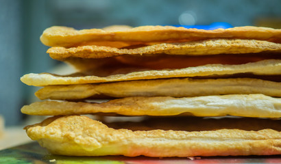 layers of puff pastry are stacked on the table