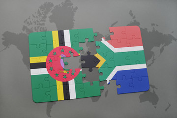 puzzle with the national flag of dominica and south africa on a world map