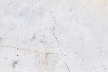 cracked white wall as a background