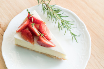 Strawberry cheese cake on wood table,Strawberry cake dessert.