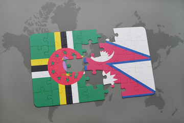 puzzle with the national flag of dominica and nepal on a world map